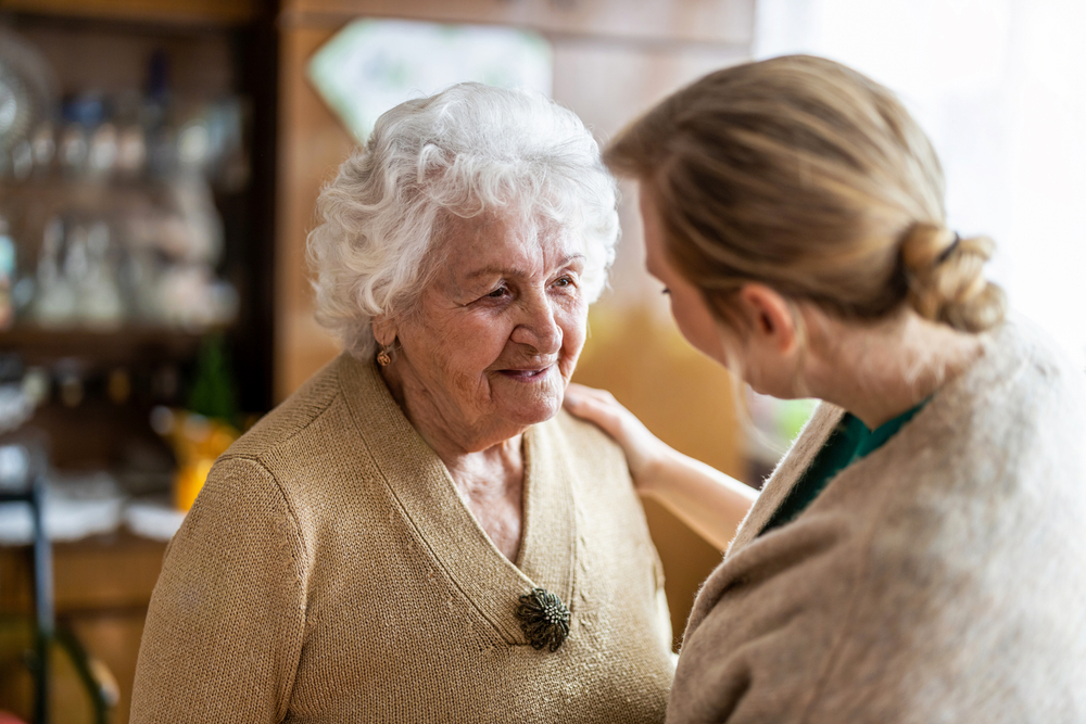 Senior receiving home health care services in Northville, MI.