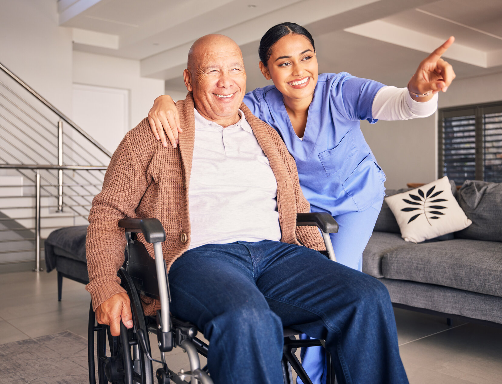 Man with caregiver in senior care management Michigan.